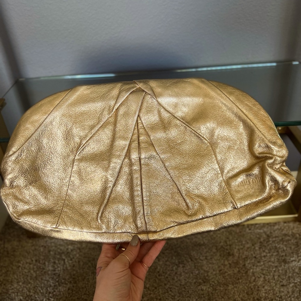 Miu Miu large gold genuine leather clutch